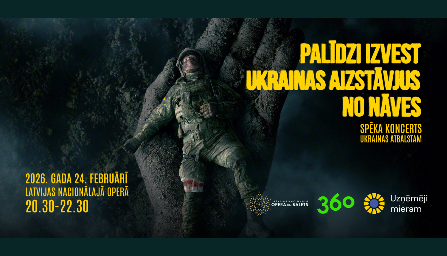 Guļošs ievainots karavīrs kara laukā un teksts “Palīdzi izvest Ukrainas aizstāvjus no nāves”, Spēka koncerts Ukrainas atbalstam