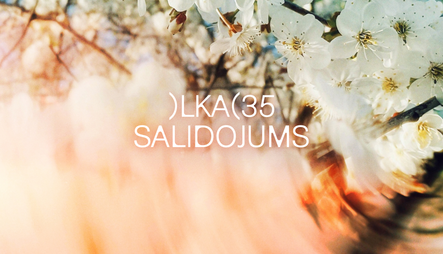 Foto ar ziediem un teksts: LKA 35 SALIDOJUMS