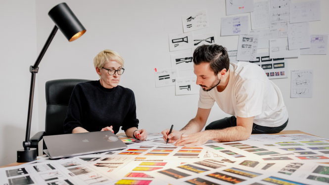 Dizainers un producente