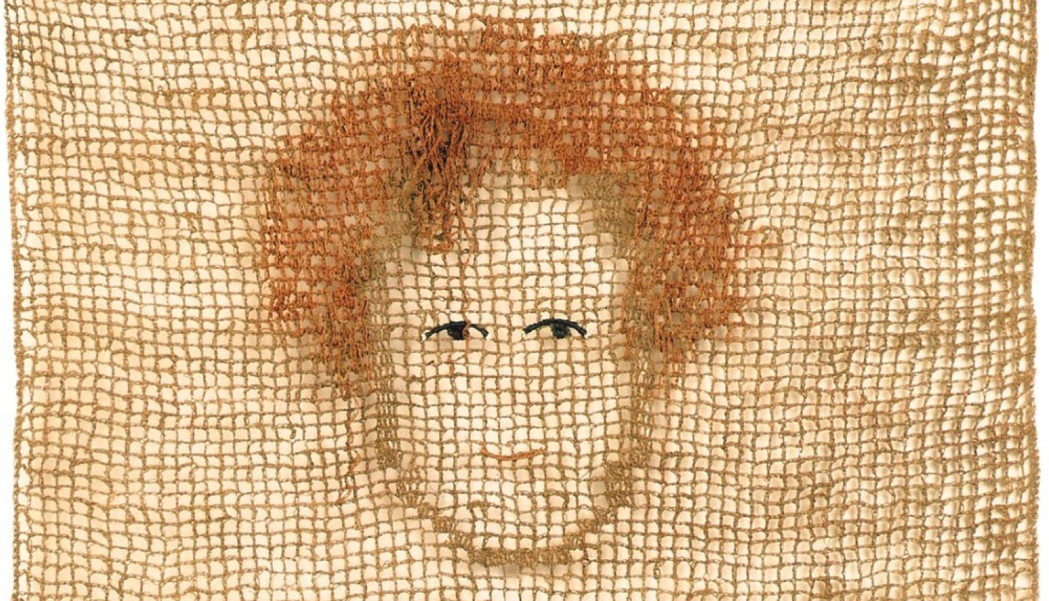 Tekstīlija ar cilvēka portretu centrā