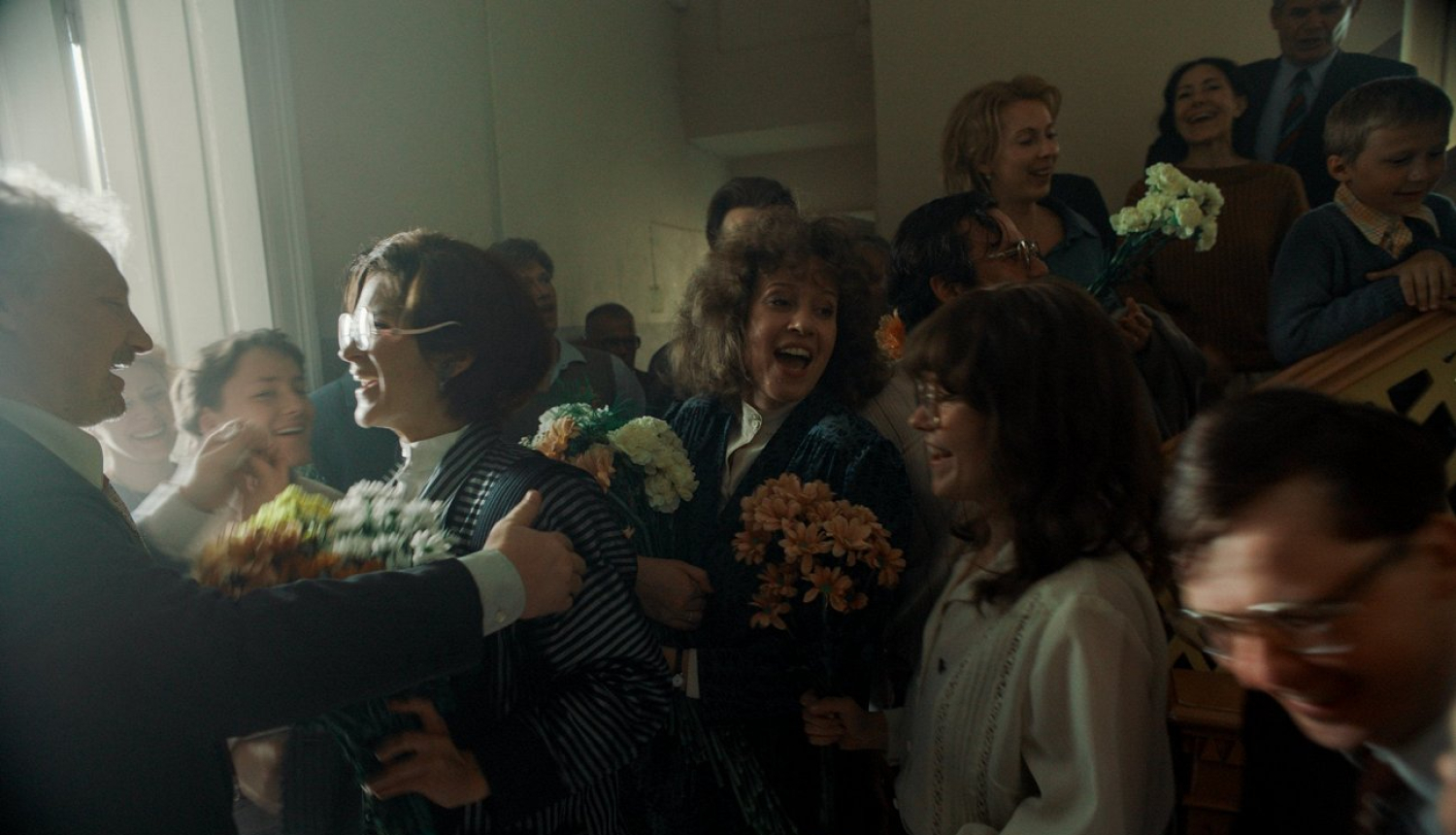 Cilvēki sanāksmju zālē