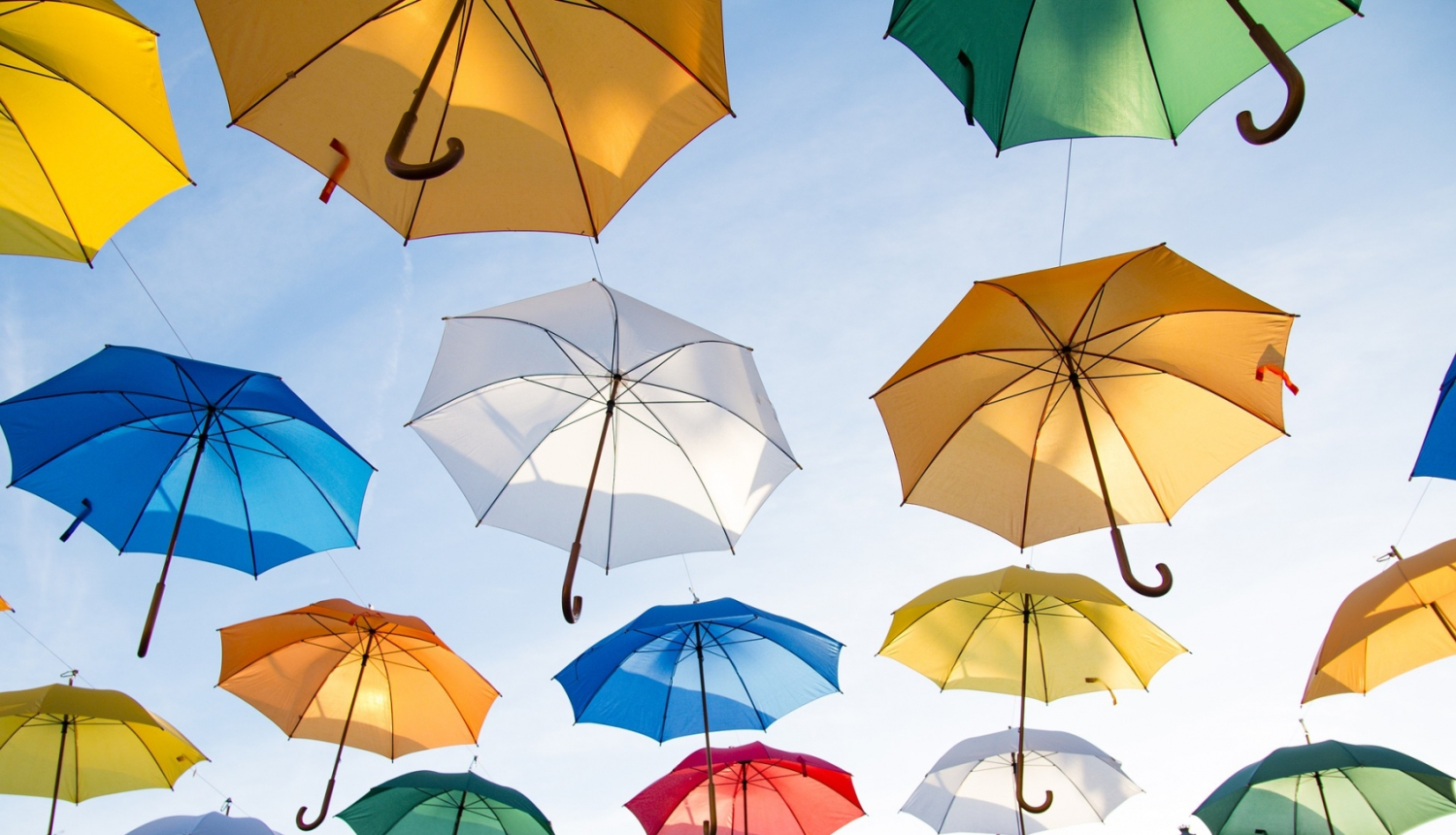 Krāsaini lietussargi